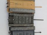 a lot of different types of train tracks on the wall