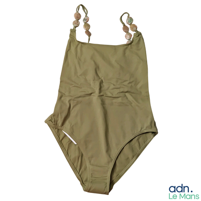 an image of a tan swimsuit with straps on the back
