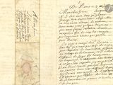 un vieux document comportant des inscriptions et sur lequel figure l'image d'une horloge au recto