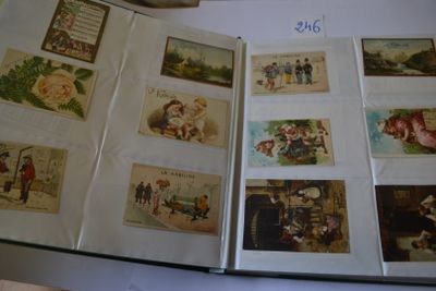 an open book with pictures of people on it sitting on a table
