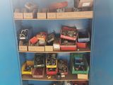 a shelf full of assorted items in a blue room