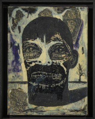 une image représentant un tableau représentant le visage d'un homme, dans un cadre noir
