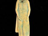 an image of a statue of a woman in a blue dress