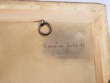 une photo d'une œuvre d'art sur laquelle figure une bague