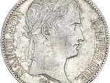a close up of a coin with a woman ' s head on it