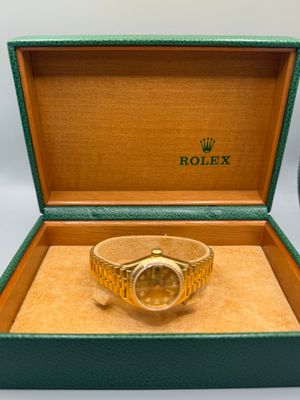 Montre Rolex pour femme en or jaune 18 carats, dans son coffret