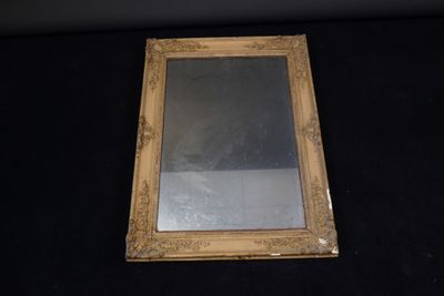 a mirror that is sitting on a black surface