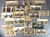 many old photographs of people and buildings on the wall