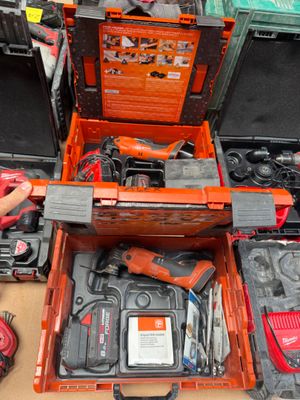 many tools that are sitting in a box on the table