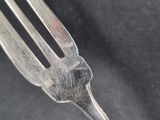 a fork that is sitting on top of a table