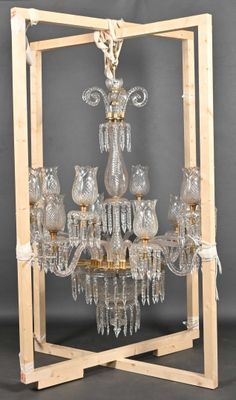 a chandelier made out of wood and glass