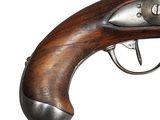 a close up of a gun on a white background