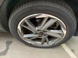a close up of a tire on a car ' s rim