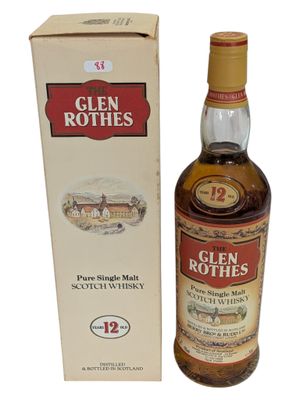 une photo d'une bouteille de whisky écossais Glen Roths à côté d'une boîte