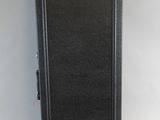an empty black case sitting on top of a white table