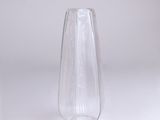 a clear glass vase that is sitting on a table