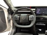 a steering wheel and dashboard of a vehicle