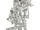 silver sculpture of a group of people made out of metal
