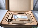 a cardboard box with a mirror in it on a table