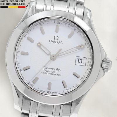an image of a close up of a watch on a white surface