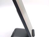 a cell phone that is sitting on a stand