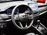 the interior of a car with a steering wheel, dashboard, and dash board