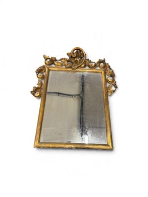 a picture of a mirror with a cross on it
