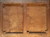 an old wooden box with two open doors on it
