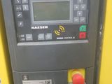 an image of a parking meter on a yellow wall