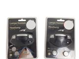 pair of two black headlamps in packaging on a white background