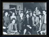 black and white photograph of a group of people posing for a picture