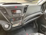the interior of a car with a steering wheel and dashboard controls