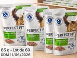 three bags of perfect fit cat food sitting on a table