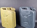 two yellow and gray jerry cans sitting next to each other on a gray surface