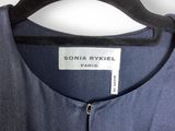a close up of a blue dress on a hanger