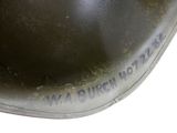a close up of a military helmet on a white background