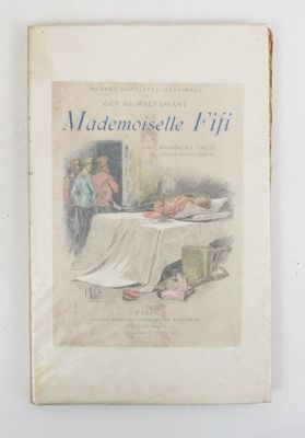 an old book with a picture of a woman and a baby