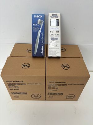 three boxes of toothbrushes are stacked on top of each other