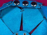 a close up of a blue origami piece of paper