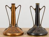 two vases sitting side by side on a table