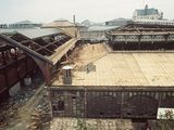 a large building that has a lot of wood on top of it