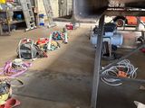 a machine that is sitting on the ground in the garage
