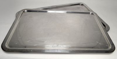 two trays that are sitting on a table