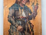 a picture of a painting of a man holding a carrot