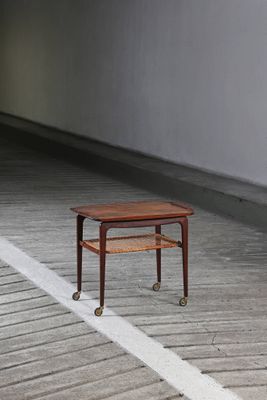 a small table that is sitting on a wooden floor