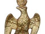 a statue of a bird with a crown on it ' s head