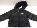 a close up of a black jacket with a hood on it