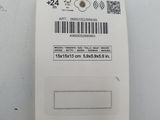 a close up of the back of a white refrigerator with a label on it