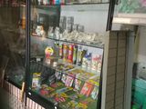 a display case with various items in it in a store