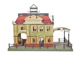 une maquette d'un bâtiment surmonté d'une horloge